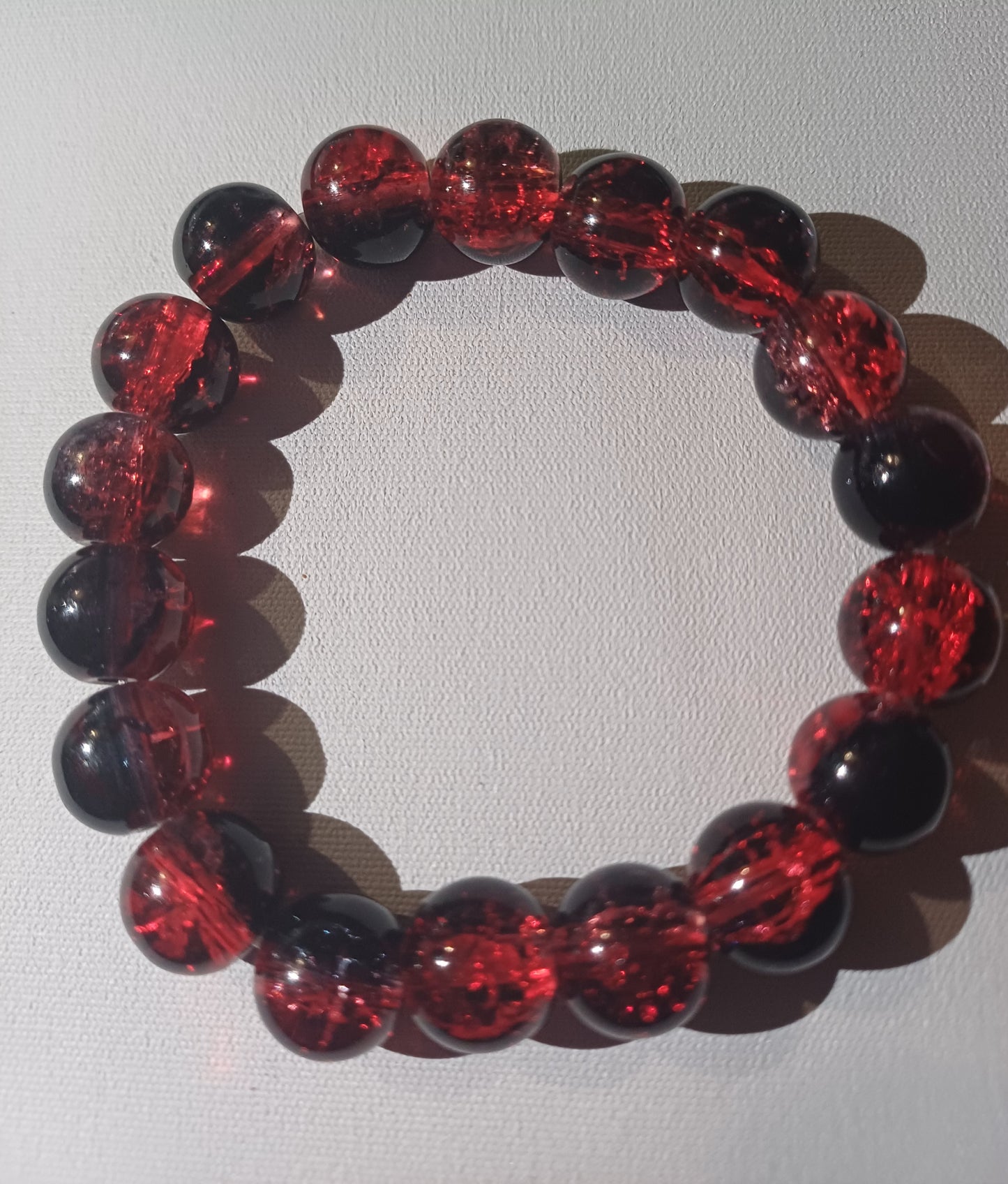 Bracelet rouge étincelant