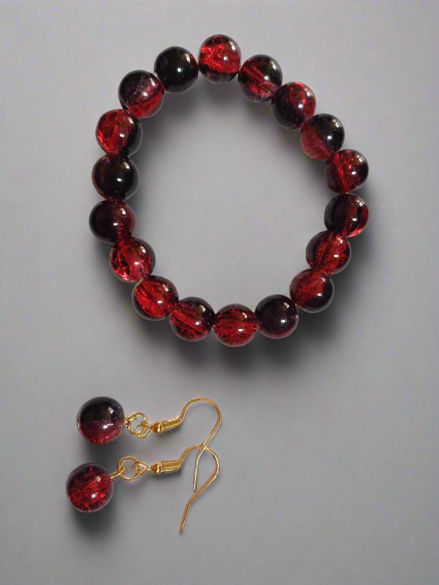 Association bracelet et boucles d'oreilles noir et rouge